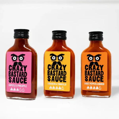 Crazy Bastard Sauce 3er Set mit den Sorten Chipotle & Pineapple, Habanero & Tomatillo, und Ghost Pepper & Mango, je 100 ml.